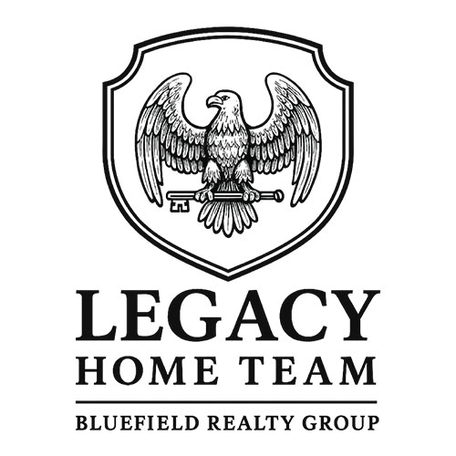 A shield with an eagle holding a key above "LEGACY HOME TEAM BLUEFIELD REALTY GROUP" in bold text.