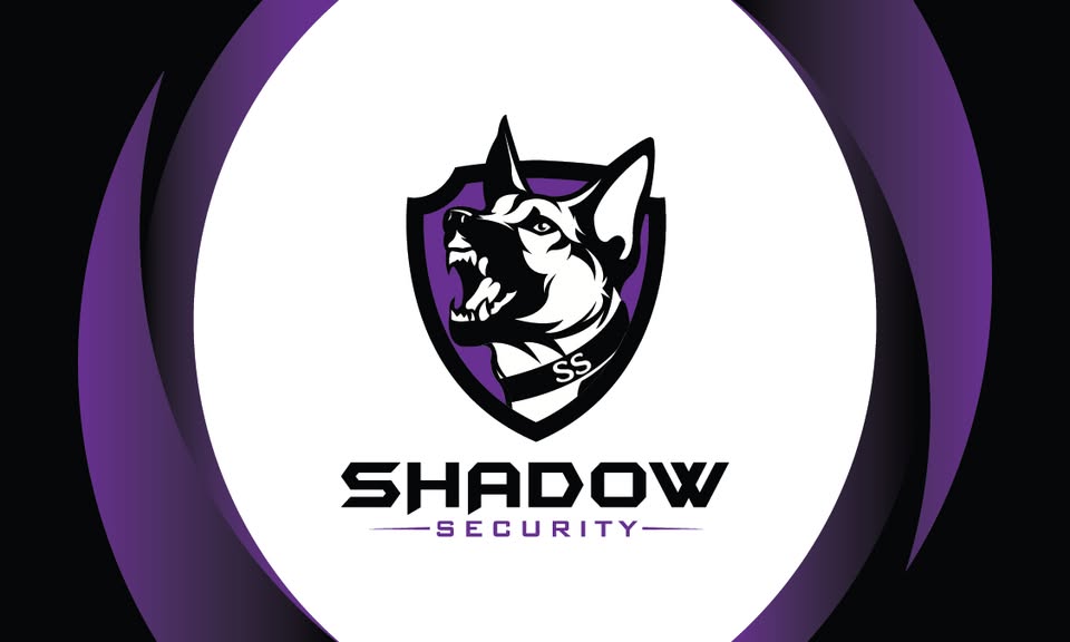 Logo with a snarling dog in a shield, labeled "SS", above the text "SHADOW SECURITY" on a white background.