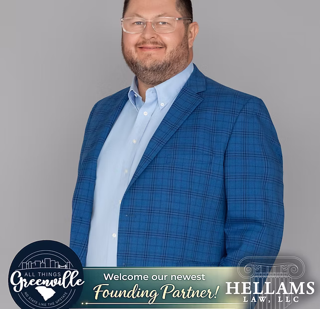 Smiling man in a blue plaid suit, text: "Founding Partner! Hellams Law, LLC, All Things Greenville.