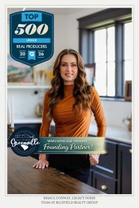 Woman standing in a modern kitchen, smiling, with award and welcome text overlays on the photo.