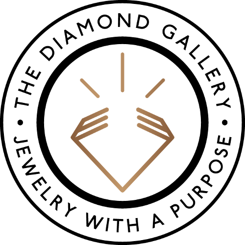 Logo of The Diamond Gallery with a stylized diamond and “Jewelry with a Purpose” written around the edge.