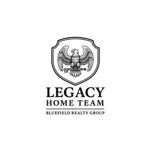 A shield with an eagle holding keys above the text "LEGACY HOME TEAM BLUEFIELD REALTY GROUP.