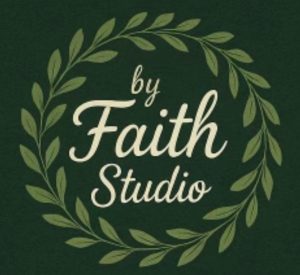 Green background with a leafy wreath framing the text “by Faith Studio” in elegant, cream-colored script.