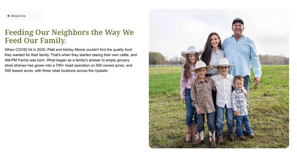 A smiling family with four children in western attire stands together in a grassy field with a fence behind them.